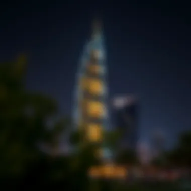 Night shot highlighting the illuminated features of Noora Tower